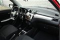 Suzuki Swift - 1.2 Select | Airco | Achteruitrijcamera | Navigatie - 1 - Thumbnail