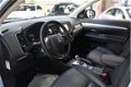 Mitsubishi Outlander - 2.0 4WD 5P Instyle+ LEER / NAVIGATIE / XENON / SCHUIFDAK / TREKHAAK - 1 - Thumbnail