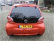 Toyota Aygo - 1.0 VVT-i 5D MMT Dynamic Orange | Navigatie - 1 - Thumbnail