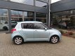 Suzuki Swift - 1.3 Shogun airco 61000 km - 1 - Thumbnail