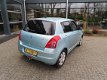 Suzuki Swift - 1.3 Shogun airco 61000 km - 1 - Thumbnail