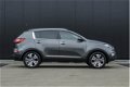 Kia Sportage - 2.0 164 PK Automaat X-clusive ✅ XENON ✅ PANO ✅ NAVI ✅ CAMERA - 1 - Thumbnail