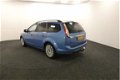 Ford Focus Wagon - 1.6 Titanium 100PK | Navi | Clima | Cruise | Trekhaak | Privacy glass | Voorruitv - 1 - Thumbnail