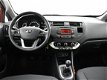 Kia Rio - 1.2 CVVT *32.651 KM* COMFORT PACK + AIRCO / 17 INCH / ORIGINEEL NEDERLANDS - 1 - Thumbnail