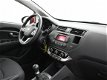 Kia Rio - 1.2 CVVT *32.651 KM* COMFORT PACK + AIRCO / 17 INCH / ORIGINEEL NEDERLANDS - 1 - Thumbnail