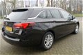 Opel Astra Sports Tourer - 1.0 Business+ AUT AIRCO I NAVI I LMV I AUT VERLICHTING I PDC I METALLIC L - 1 - Thumbnail