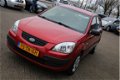 Kia Rio - 1.4 X-pect | Airco | Elektrische ramen | APK 22-02-2021 | - 1 - Thumbnail