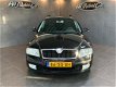 Skoda Octavia Combi - 2.0 TDI Elegance - 1 - Thumbnail