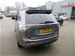 Mitsubishi Outlander - 2.0 PHEV Executive Edition /1STE EIG/5-DRS/NAVI/AIRCO/PDC - 1 - Thumbnail