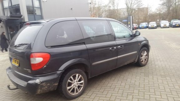 Chrysler Voyager - 3.3i V6 SE Luxe - 1