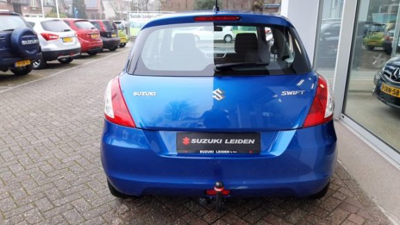 Suzuki Swift - 1.2 COMFORT EASSS Airco | Stoelverwarming | Trekhaak - 1