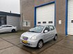 Kia Picanto - 1.1 EX AUTOMAAT AIRCO WEINIG GELOPEN - 1 - Thumbnail