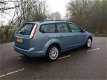 Ford Focus Wagon - 1.6 TDCi Titanium /CLIMA/ KLEUREN NAVI/ EURO 4/ BJ 2009 - 1 - Thumbnail