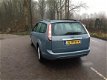 Ford Focus Wagon - 1.6 TDCi Titanium /CLIMA/ KLEUREN NAVI/ EURO 4/ BJ 2009 - 1 - Thumbnail