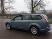 Ford Focus Wagon - 1.6 TDCi Titanium /CLIMA/ KLEUREN NAVI/ EURO 4/ BJ 2009 - 1 - Thumbnail