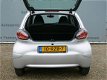 Toyota Aygo - 5 Drs - Airco - Silver Edition -Navigatie- 27000 KM - 1 - Thumbnail