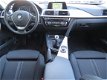 BMW 3-serie - 318i Essential 1e EIGENAAR NL AUTO SPORTSTOELEN WIT METALLIC NAVI ECC CRUISE - 1 - Thumbnail