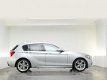 BMW 1-serie - 118i Business+ - 1 - Thumbnail