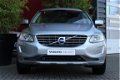 Volvo XC60 - D3 136pk Geartronic Momentum | Park Assist V+A / Stuurverwarming / City Safety / Naviga - 1 - Thumbnail