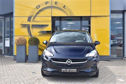 Opel Corsa - 1.4 Favourite | Cruise Control | Airconditioning | Telefoonverbinding | (City) Stuurbek - 1