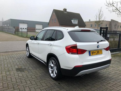 BMW X1 - SDrive18i Executive | Leder Navi Pro PDC | 1e eigenaar - 1