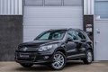 Volkswagen Tiguan - 1.4 TSI Comfort&Design Panoramadak, Rij-assistent, PDC - 1 - Thumbnail