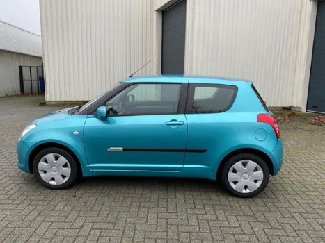 Suzuki Swift - 1.3 Comfort 1ste eigenaar / Airco / Lees advertentie - 1