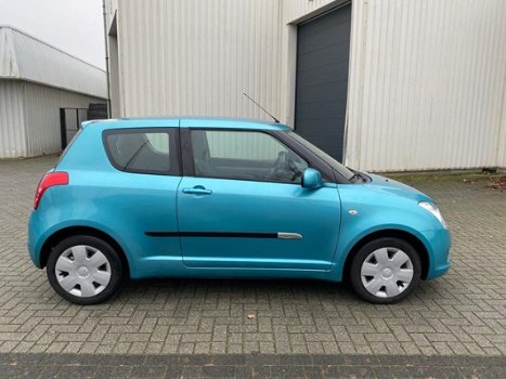 Suzuki Swift - 1.3 Comfort 1ste eigenaar / Airco / Lees advertentie - 1