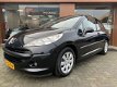 Peugeot 207 - 1.4 VTi Cool 'n Blue - cruise control, koppeling met telefoon en airco - 1 - Thumbnail