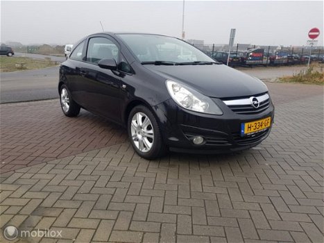 Opel Corsa - 1.2-16V Cosmo - 1