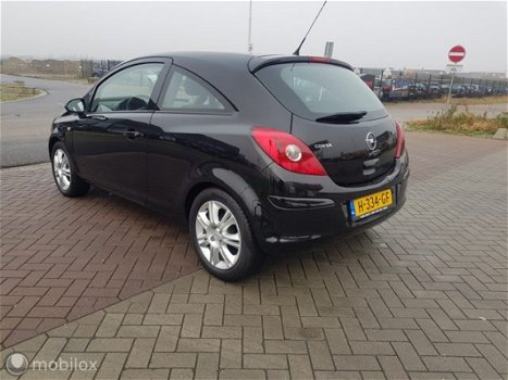 Opel Corsa - 1.2-16V Cosmo - 1