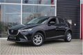 Mazda CX-3 - 2.0 SkyActiv-G 120 TS+ Automaat, Navi, PDC - 1 - Thumbnail