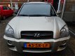 Hyundai Tucson - 2.0i Style 1E EIGENAAR met 124000 km CLIMATE CONTROLE CRUISE - 1 - Thumbnail