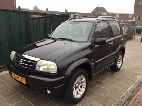 Suzuki Grand Vitara - 1.6 Metal Top FreeStyle-3 - 1