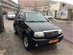 Suzuki Grand Vitara - 1.6 Metal Top FreeStyle-3 - 1 - Thumbnail