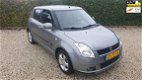 Suzuki Swift - 1.3 Exclusive Automaat/Airco/5drs - 1 - Thumbnail