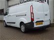 Ford Transit Custom - L2H1 *3-Pers* 2.2 TDCI 2xSchuifd Trekh LANG Stoelverw Airco Bluet Cruise - 1 - Thumbnail