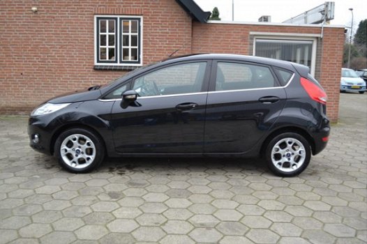 Ford Fiesta - 1.25 Titanium 5.Drs 1e eigenaar bj.2012 107.000 km airco lm.velgen stoelverw. el.ramen - 1