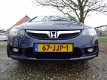 Honda Civic - 1.3 Hybrid | Navi + Clima + Cruise + PDC nu € 3.450, - 1 - Thumbnail