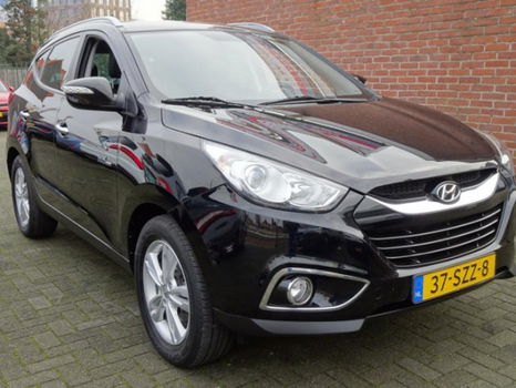 Hyundai ix35 - 1.6i GDI Style Navi / PDC / Cruise / Achteruitrijcamera / Trekhaak - 1