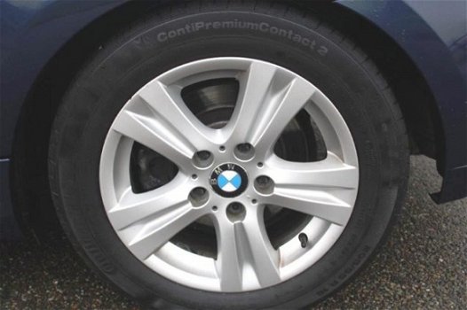 BMW 1-serie - 118I 2.0 143pk Ultimate Edition ECC leer/airco/cruise/navi/xenon - 1