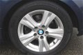 BMW 1-serie - 118I 2.0 143pk Ultimate Edition ECC leer/airco/cruise/navi/xenon - 1 - Thumbnail