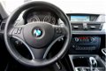 BMW X1 - 2.0i sDrive, AUTOMAAT * XENON * NAVIG * SPORTINTERIEUR 2.0 - 1 - Thumbnail