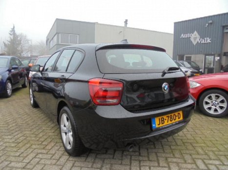 BMW 1-serie - 118d High Executive Sport. Climate. Navi. Cruise. Leer. PDC - 1