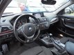 BMW 1-serie - 118d High Executive Sport. Climate. Navi. Cruise. Leer. PDC - 1 - Thumbnail