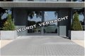Volkswagen Up! - 1.0 TSI GTI 116pk | Stoelverwarming | Parkeersensoren | Climatronic | Cruise - 1 - Thumbnail