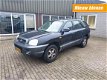 Hyundai Santa Fe - 2.4I 16V 4WD AIRCO LEER - 1 - Thumbnail