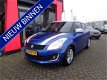 Suzuki Swift - 1.2 S-Edition EASSS / DAKSPOILER / 16 INCH LMV - 1 - Thumbnail