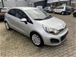 Kia Rio - 1.2 CVVT Edition 7 Airco, Navi, PDC - 1 - Thumbnail