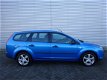 Ford Focus Wagon - 1.6-16V Ambiente - 1 - Thumbnail